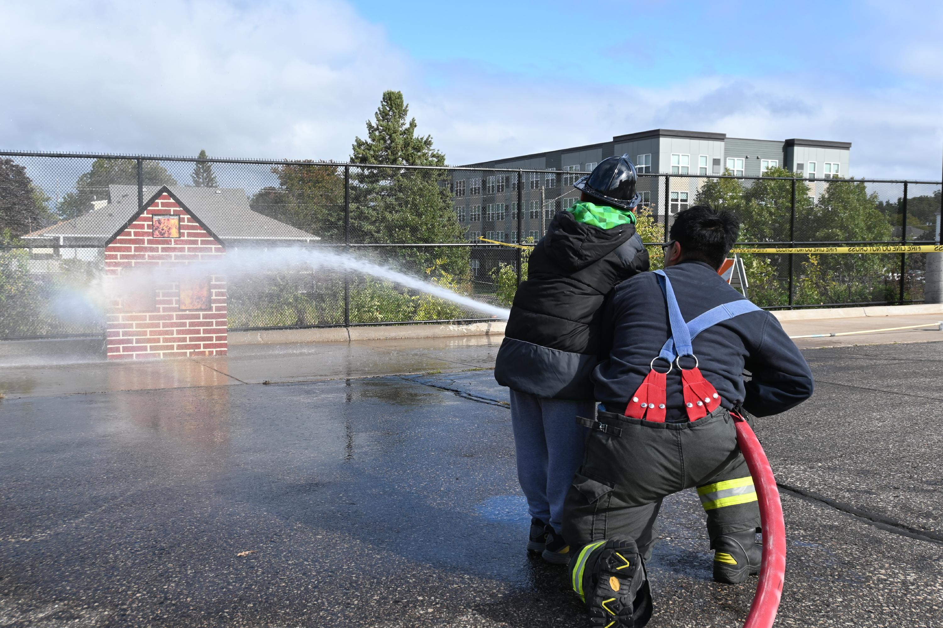 Spraying Fire House at Fire Department Open House