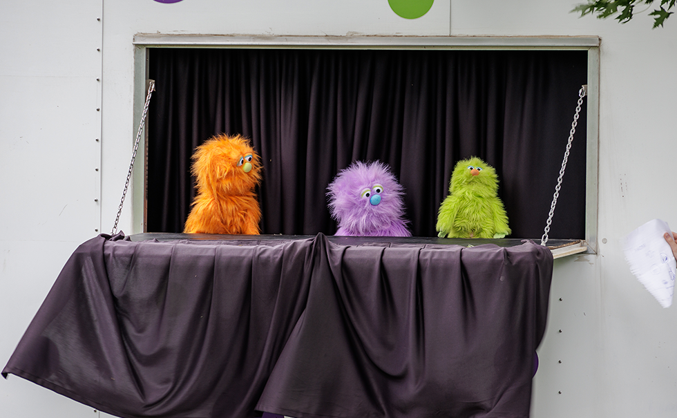 Puppeteers perform a Spark! Puppet Show