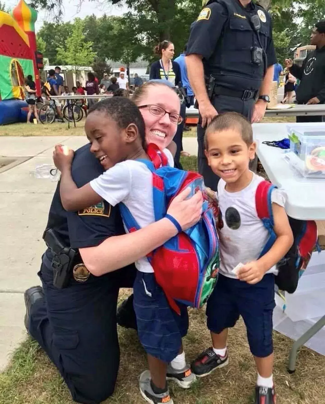 Police officer and kids at Safe Summer Nights